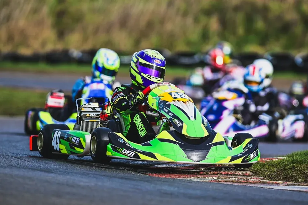 Dave Edwards Racing kart leading a pack on circuit